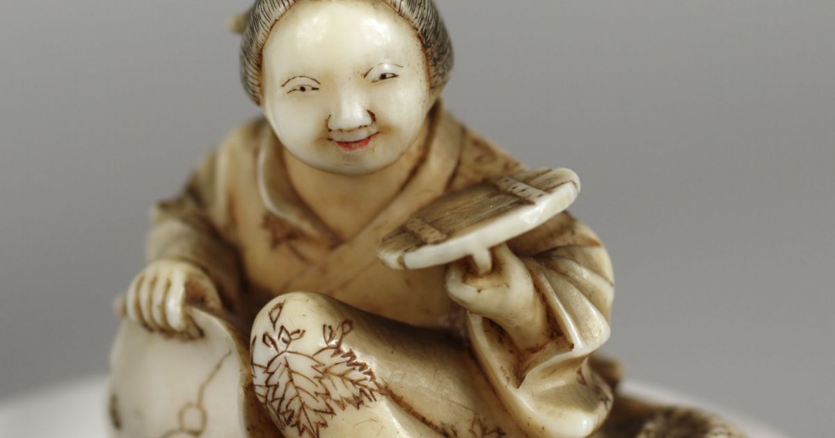 Woman Holding Bowl Netsuke